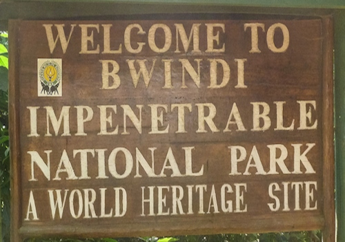Wooden welcome sign for Bwindi Impenetrable National Park, a World Heritage Site